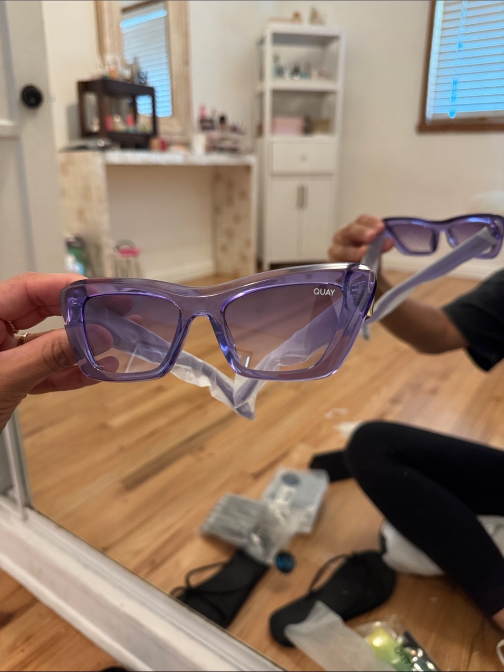 Quay Australia Lavender Cat-Eye Sunglasses on the radio